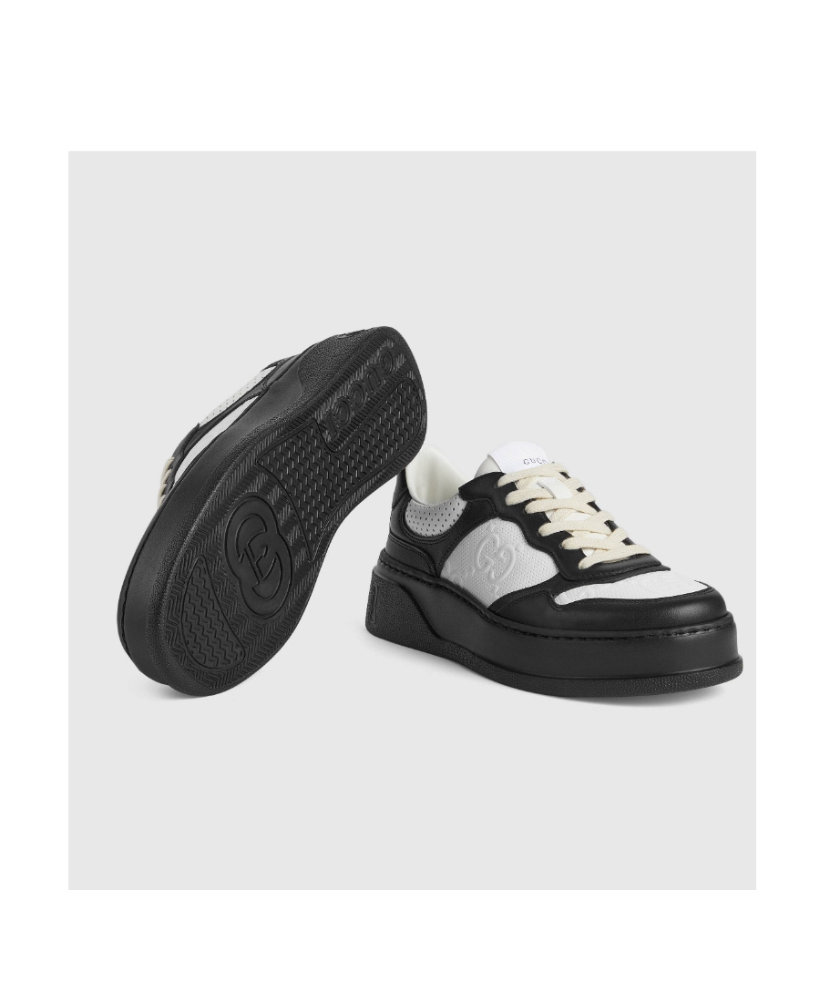 Gucci Gg Embossed Low-top Sneakers In Black
