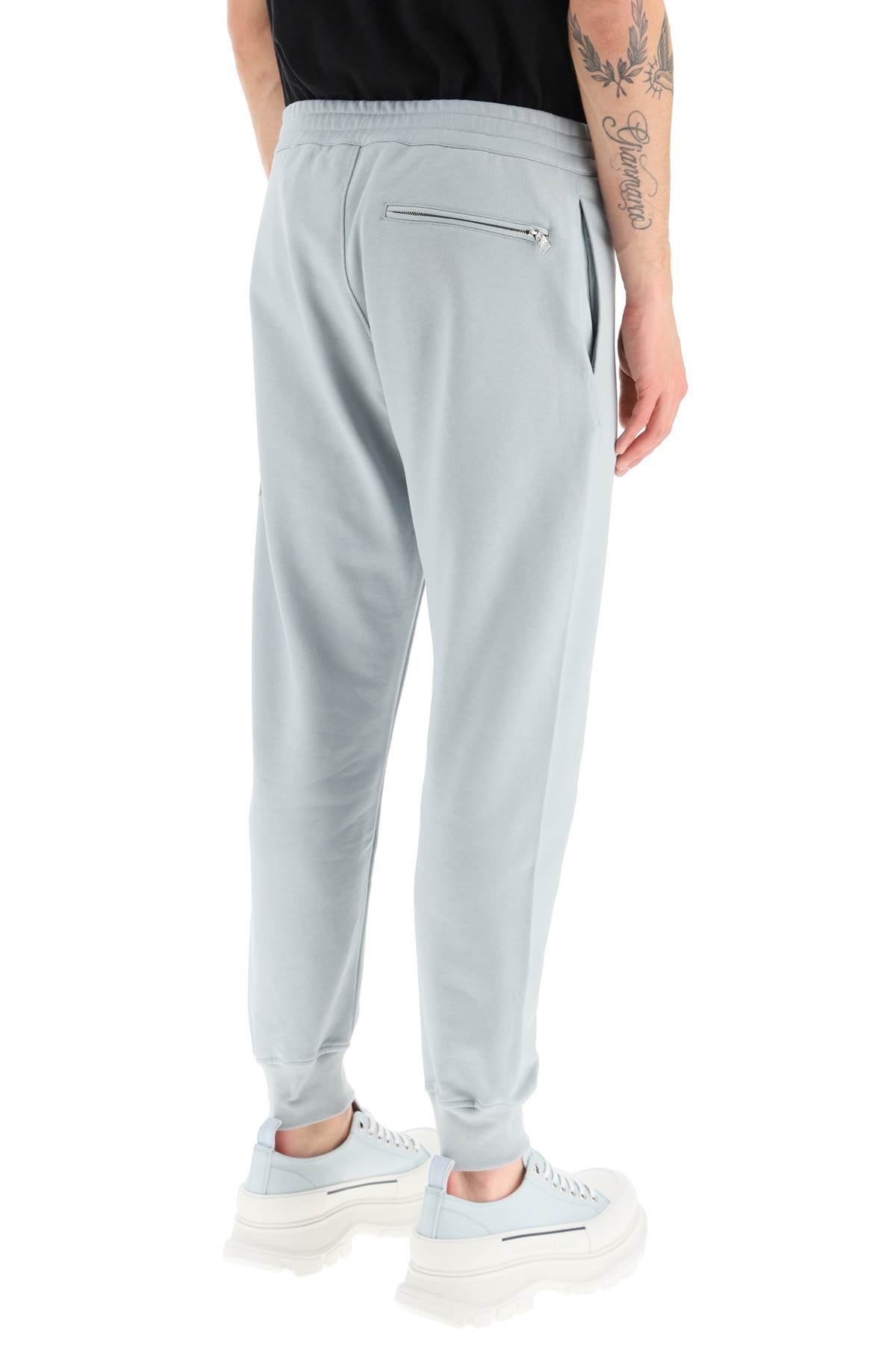 Alexander Mcqueen Logo-print Cotton Track Pants In Gray