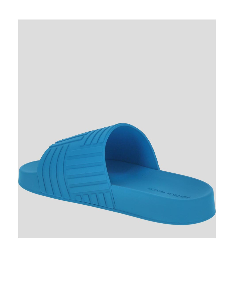 Bottega Veneta Debossed Rubber Slides In Blue