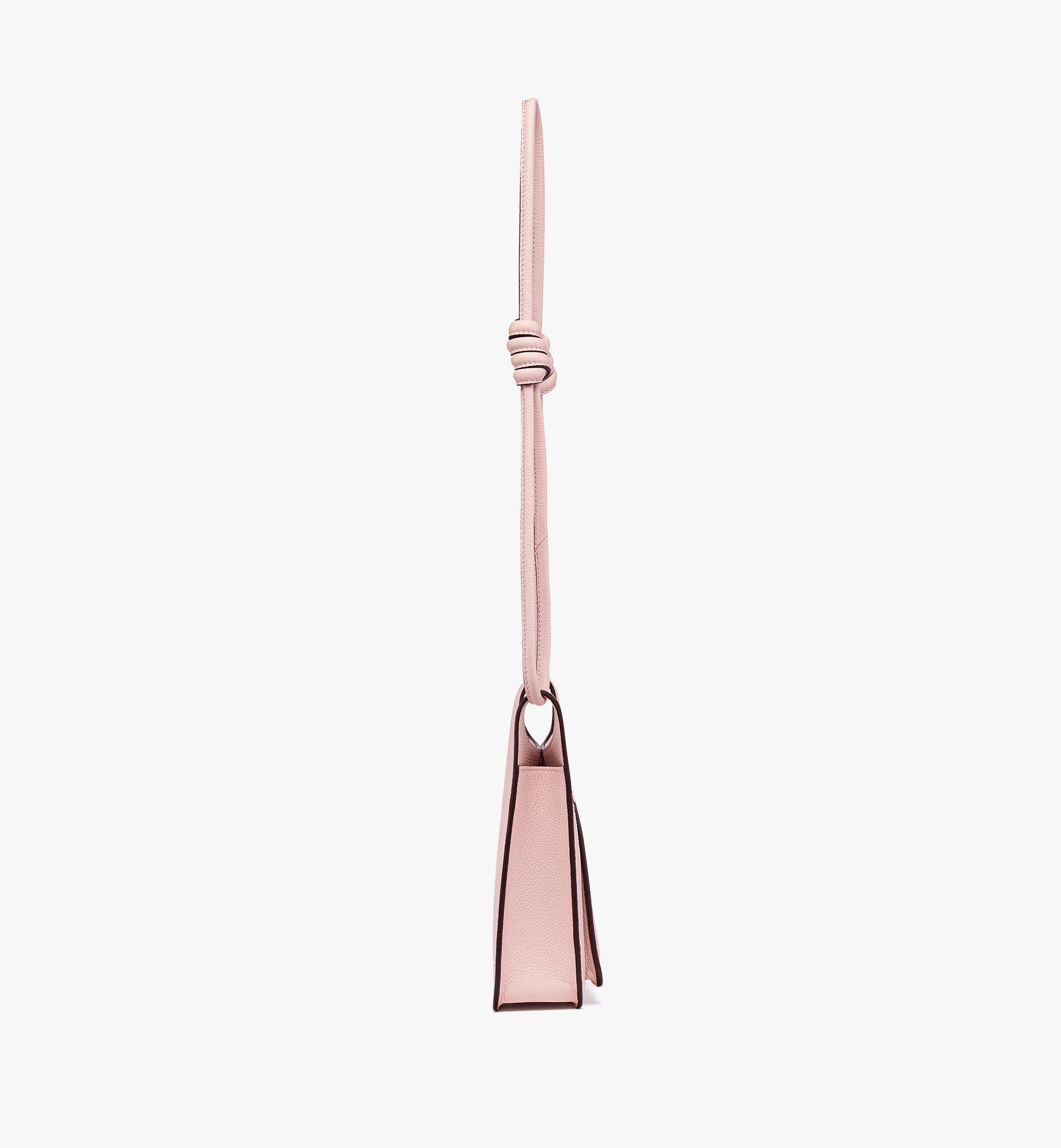 Mcm Himmel Embossed Logo Leather Semilunar Shoulder Bag In Pink