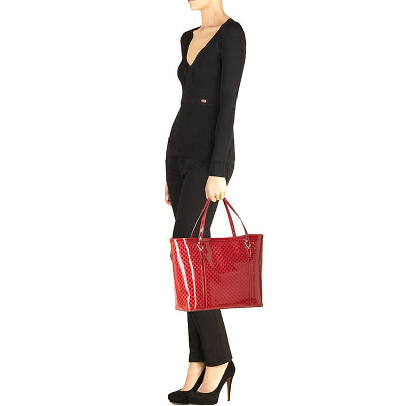 GUCCI EMBOSSED HANDBAG