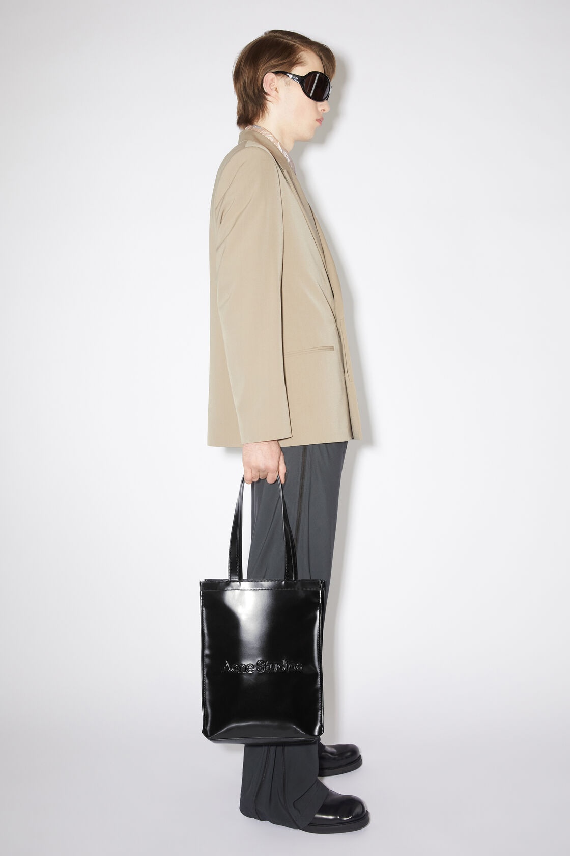 Shop Acne Studios Embossed-logo Tote Bag In Black