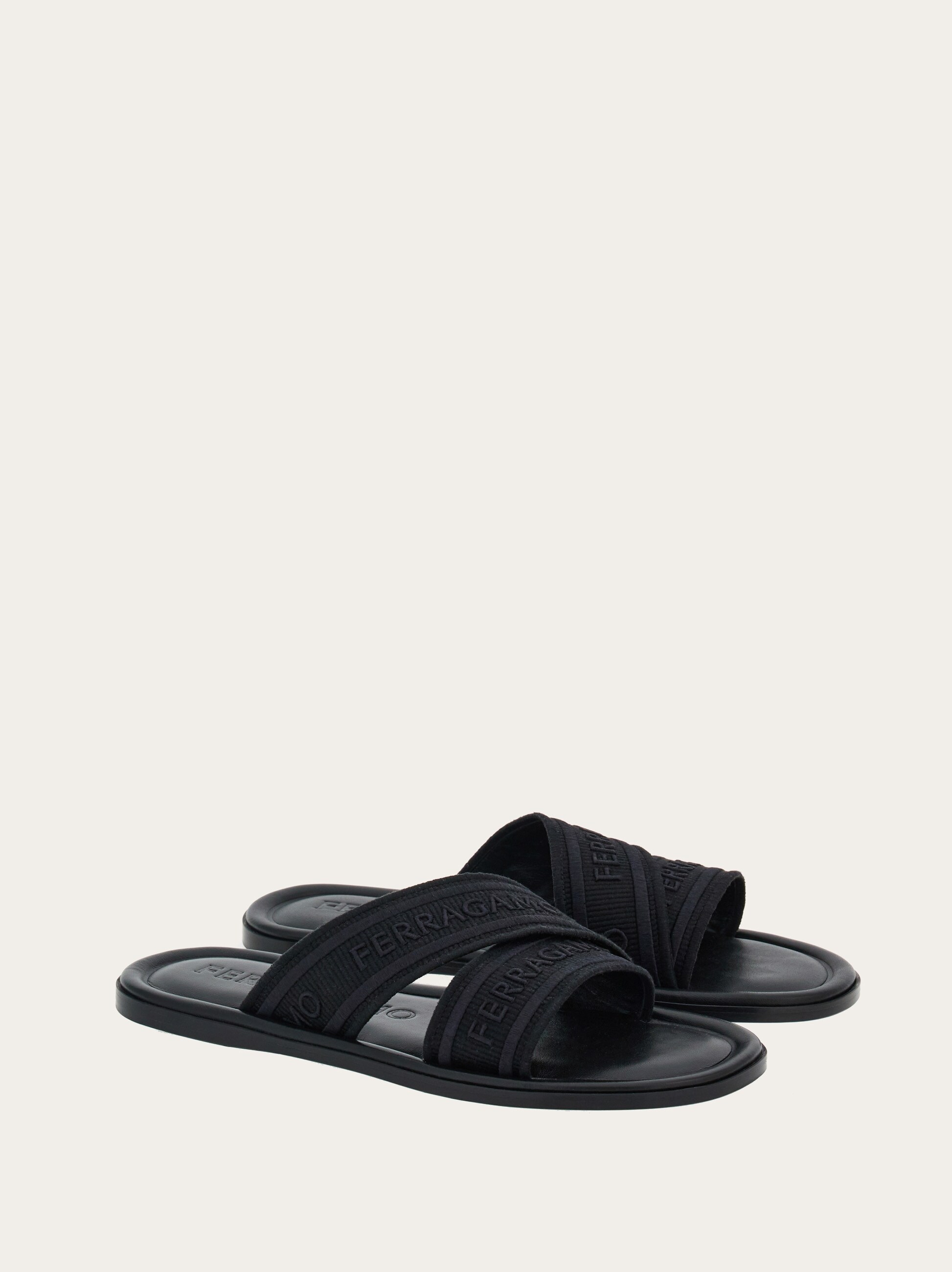 Ferragamo Logo-print Slip-on Style Slides In Black
