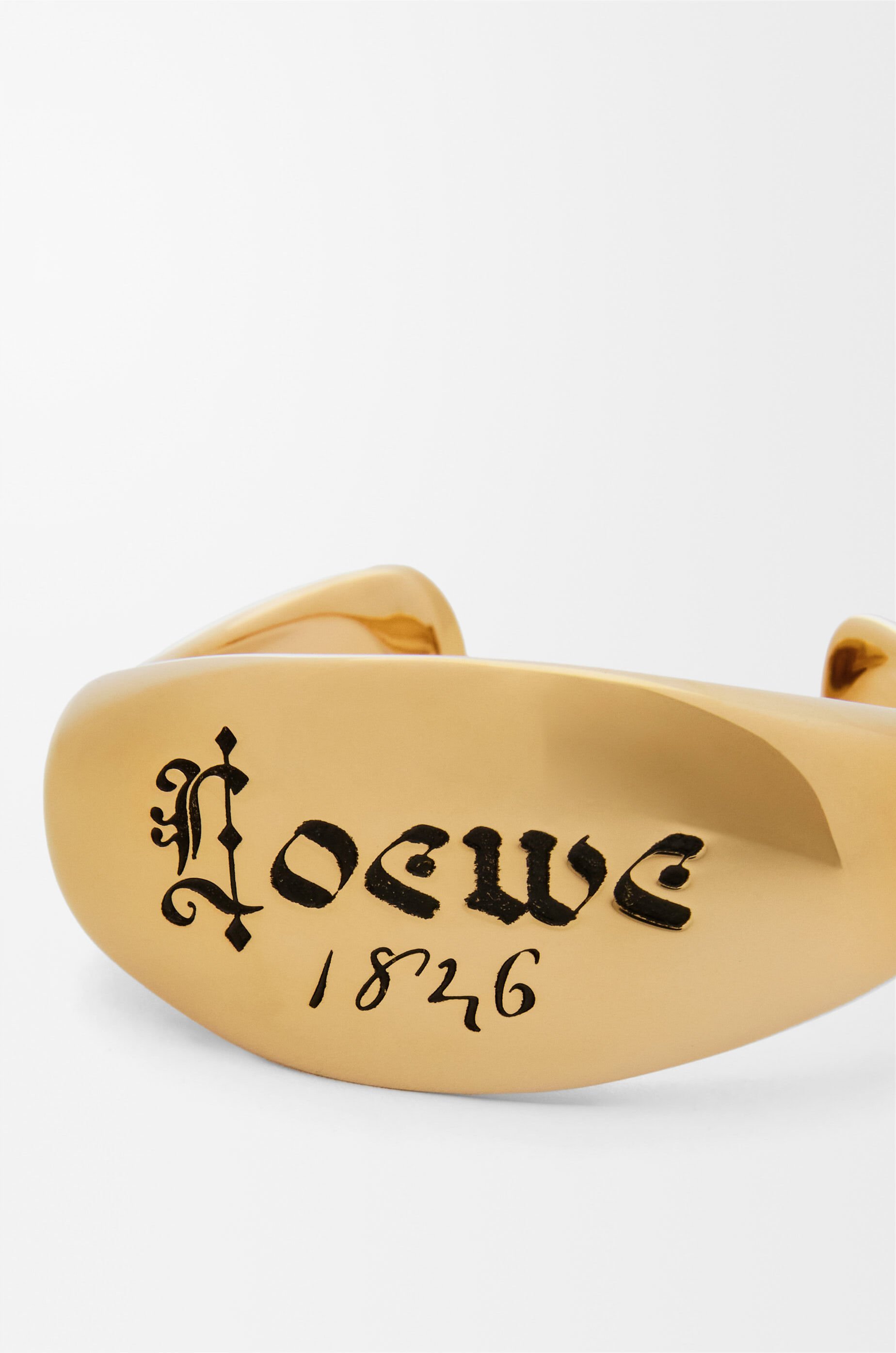 Loewe Seal Cuff Bracelet In Yellow