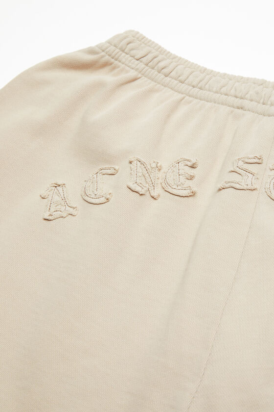 Acne Studios Logo Sweatpants In Nude