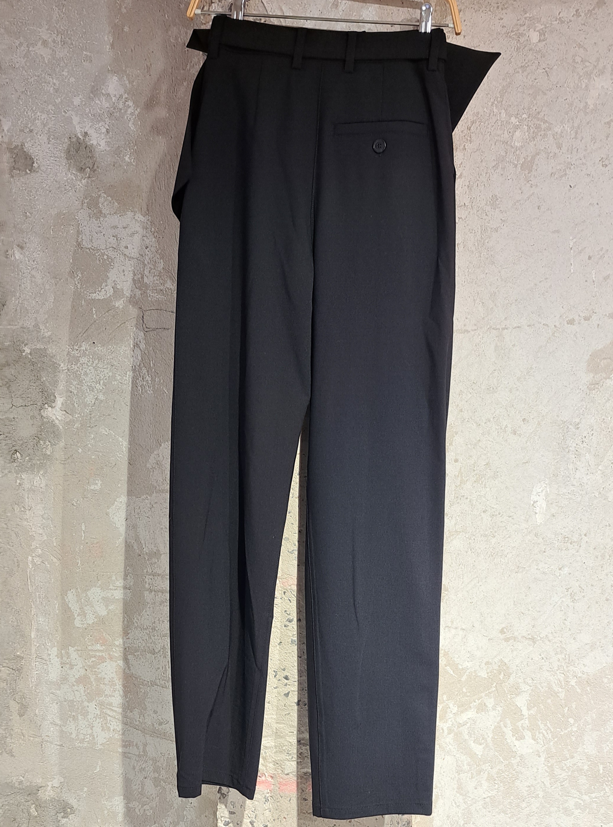 Jw Anderson Folded Stretch-wool Trousers In Black