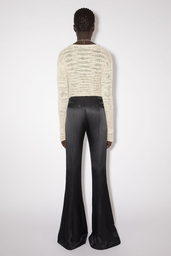 Acne Studios Low-rise Flared Trousers In Black