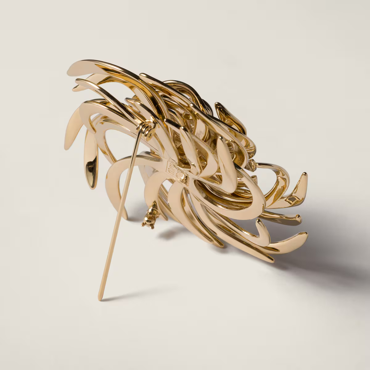 Miu Miu Spilla Miu Tourbillon In Gold