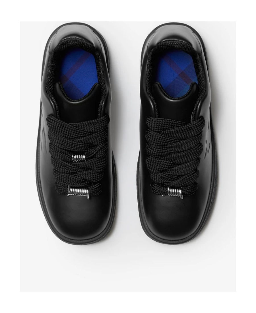 Shop Burberry Bubble Leather Sneakers In Black