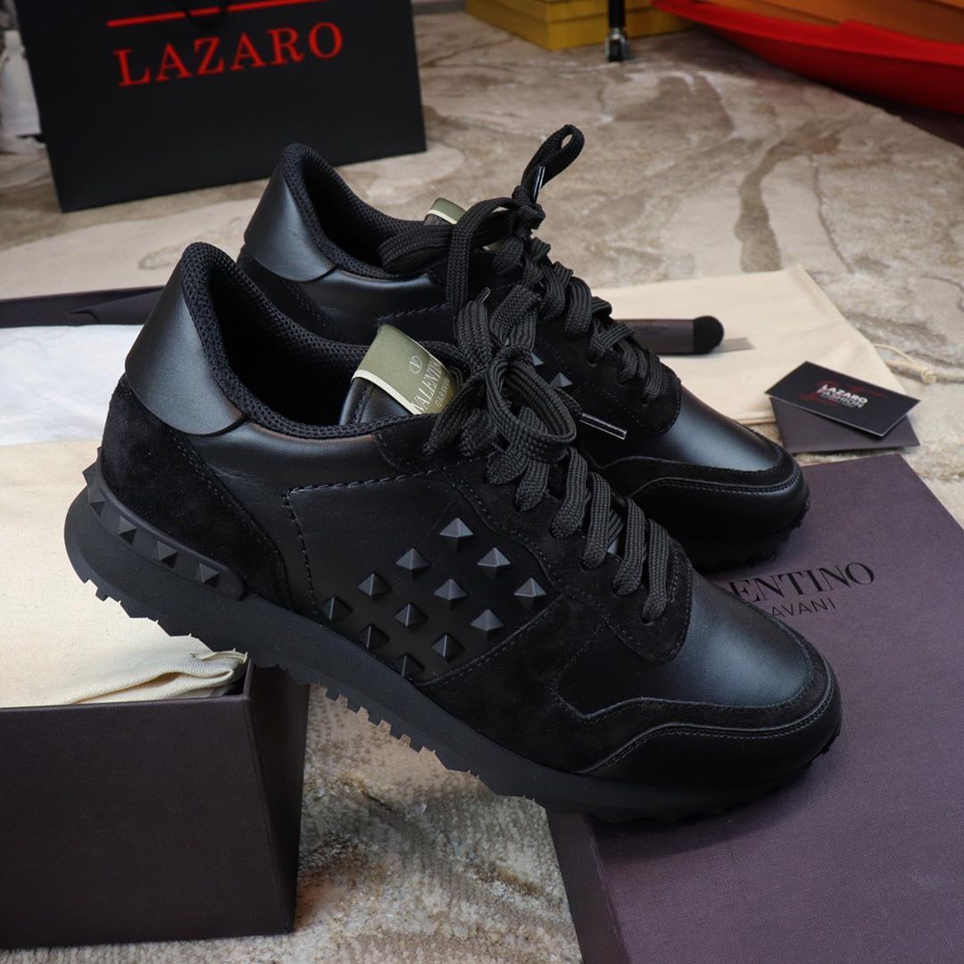 Shop Valentino Rockstud Low-top Sneakers In Black