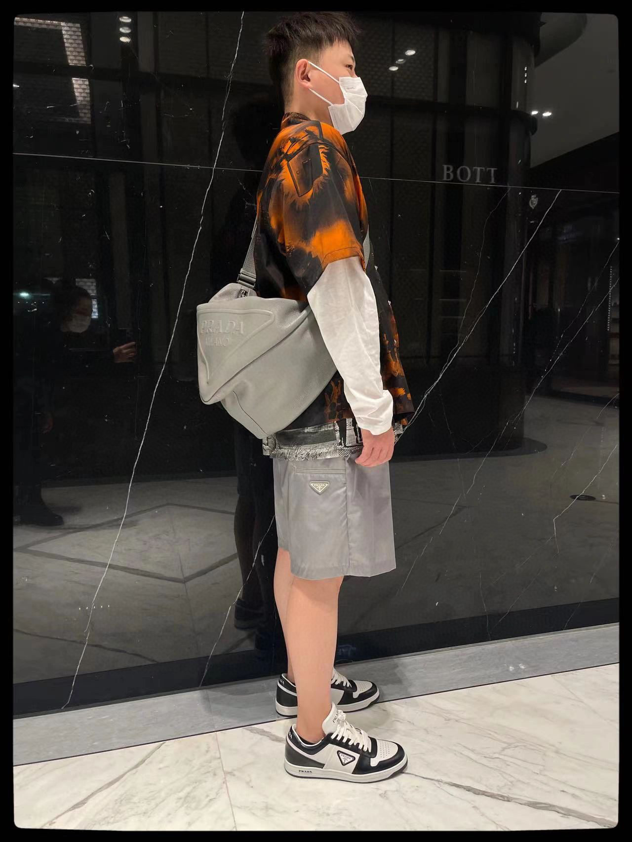 Prada Button Zipper Shorts In Gray