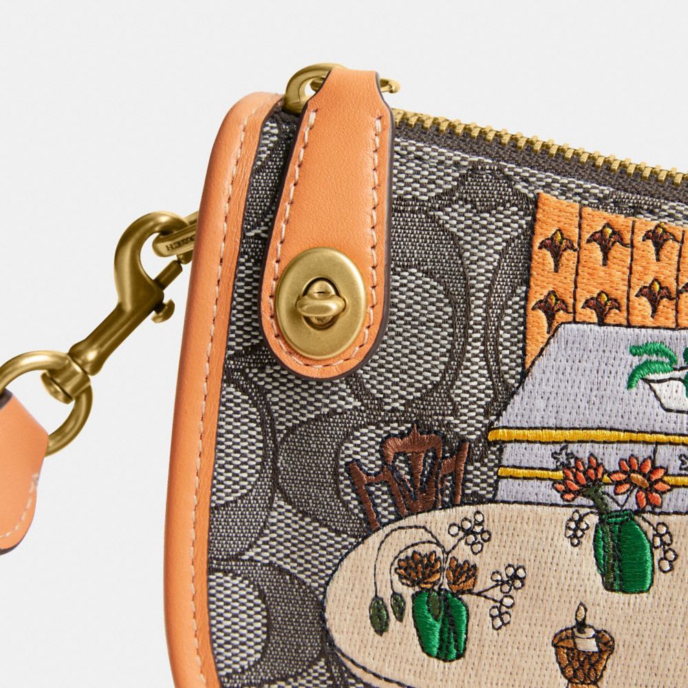 COACH SWINGER 20 HANDBAG