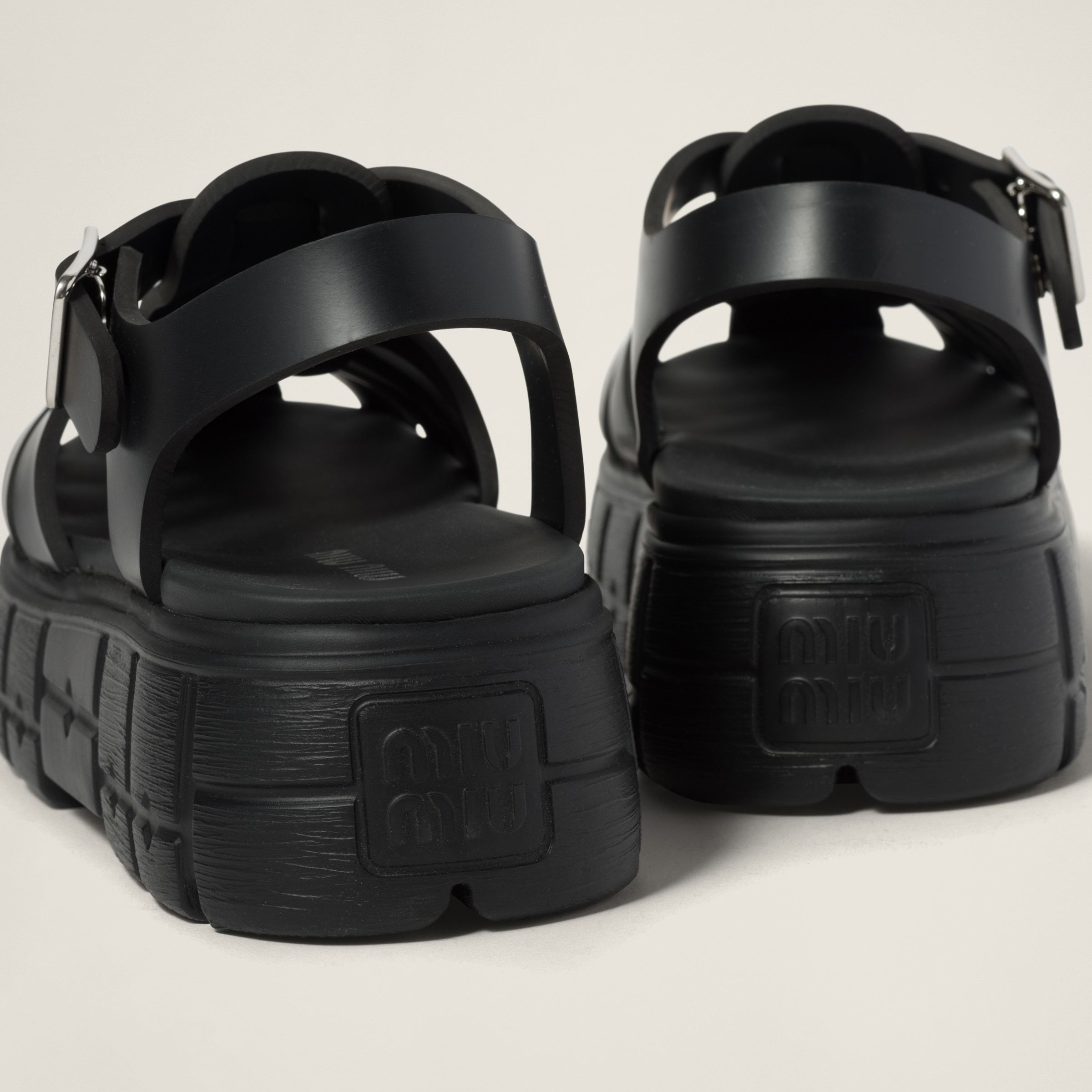 Miu Miu Logo-embossed Chunky Caged Sandals In Black