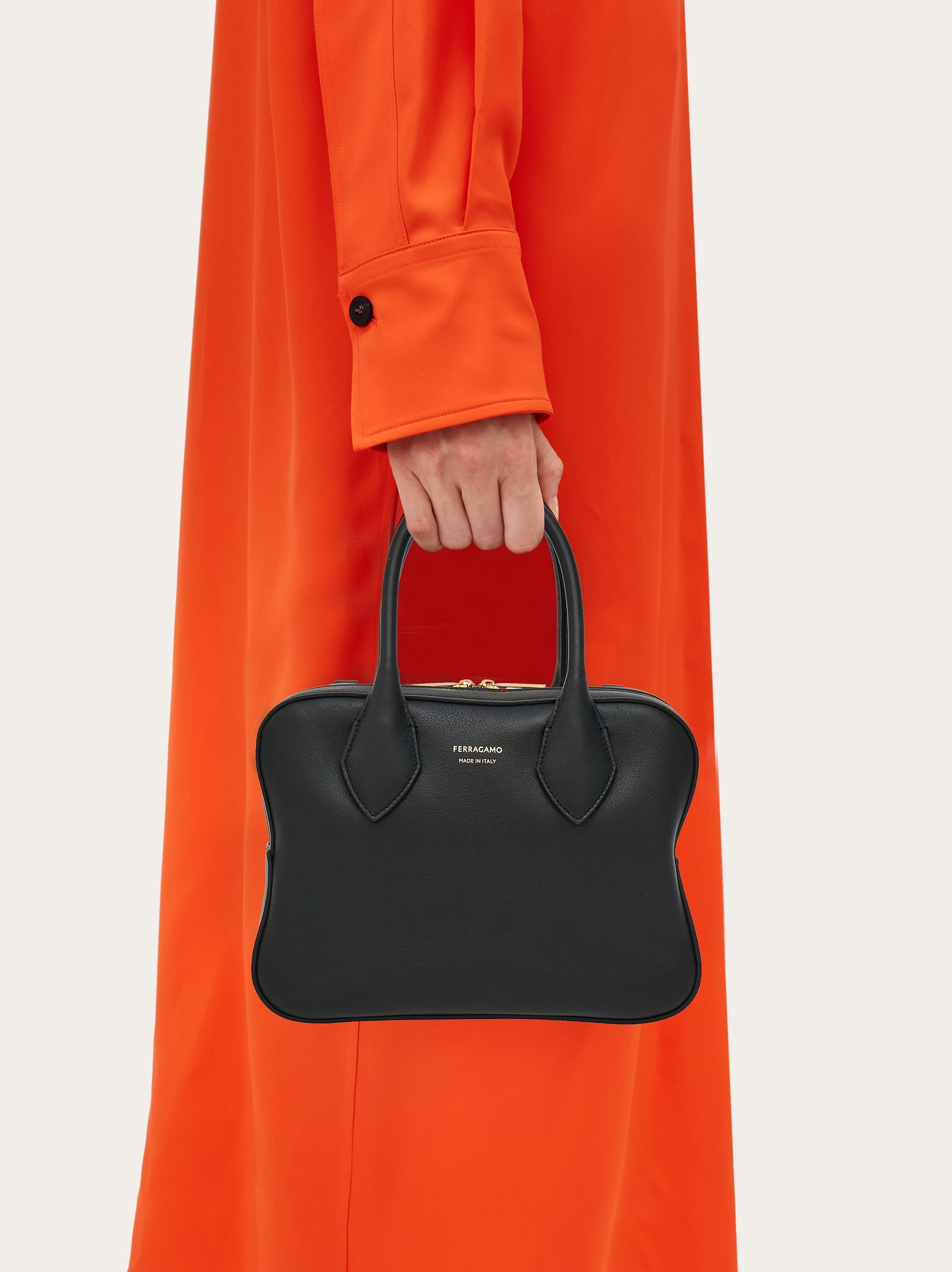 Ferragamo Logo Printed Handbag In Black