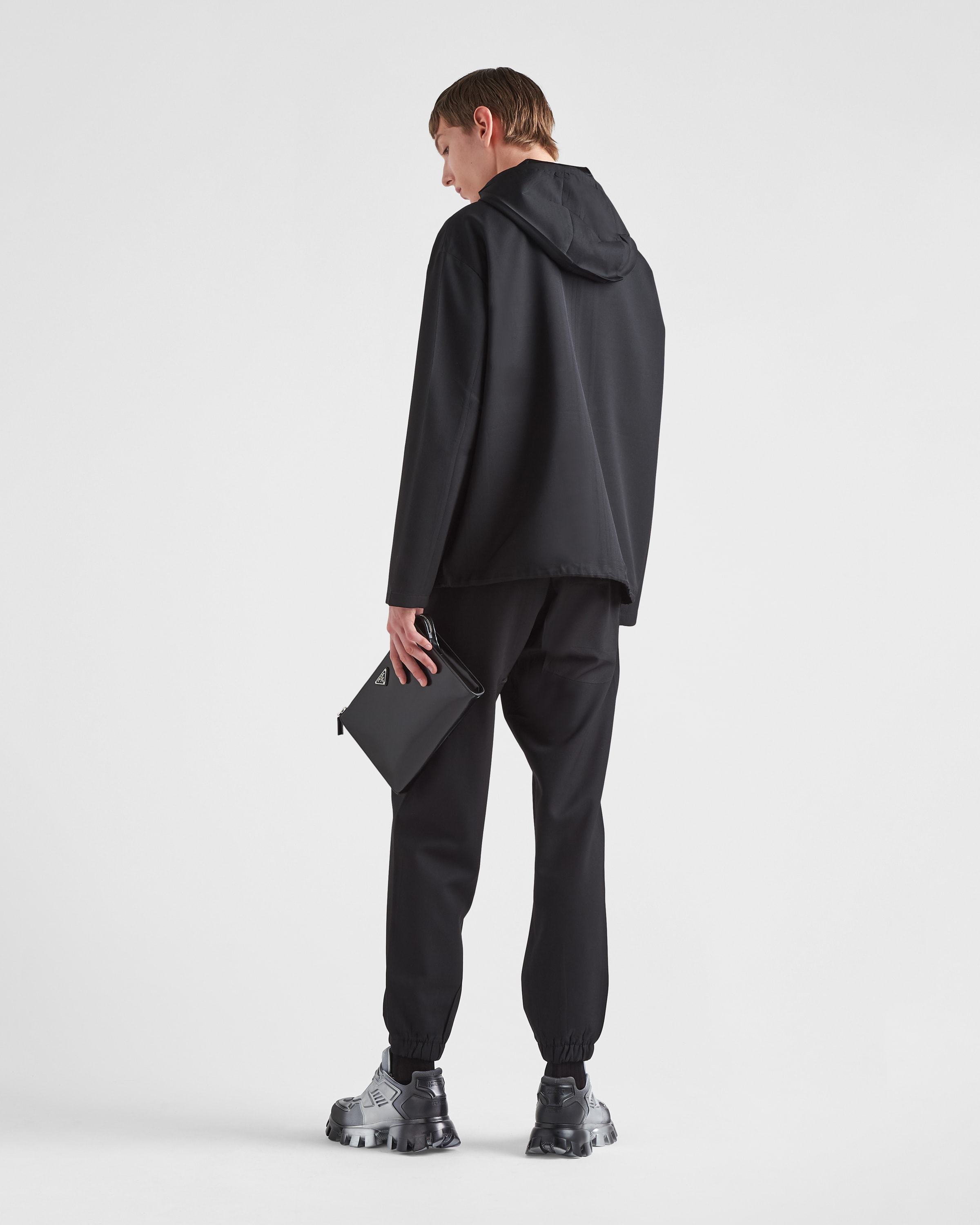Prada Logo-plaque Tailored Trousers In Black