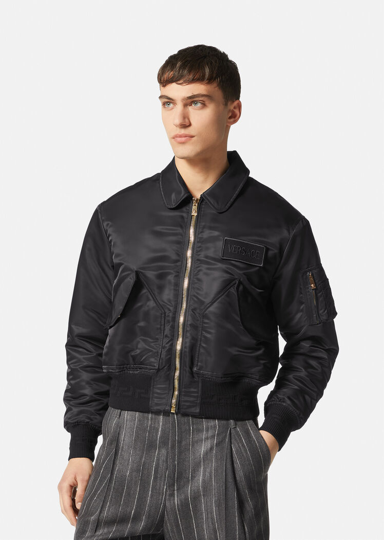 Versace Quilted Zip-up Bomber Jacket With Logo Patch In Black