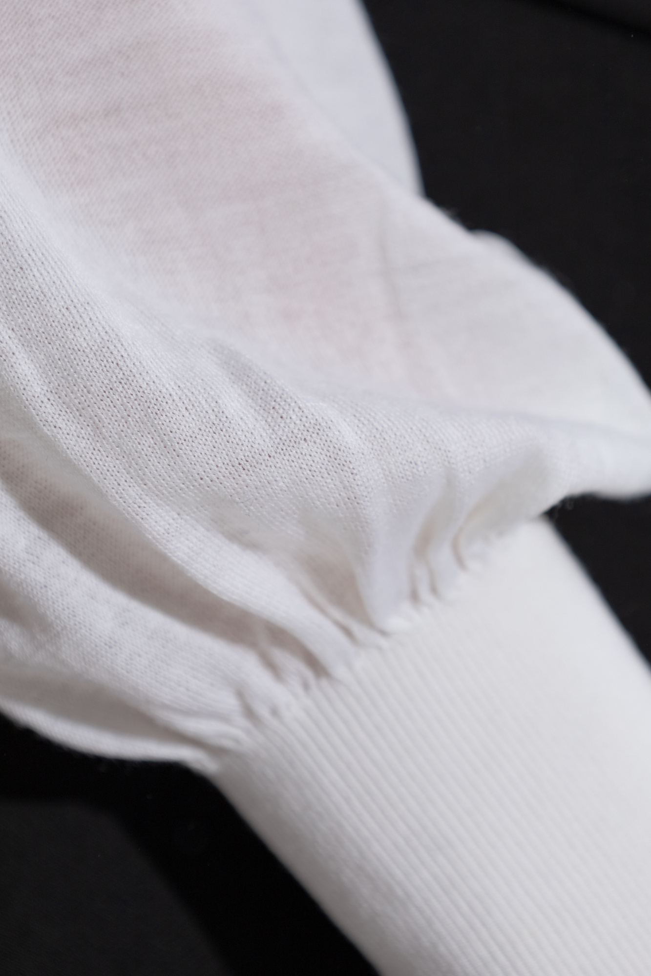 Alaïa High-collar Long-sleeved Jumpsuit In White