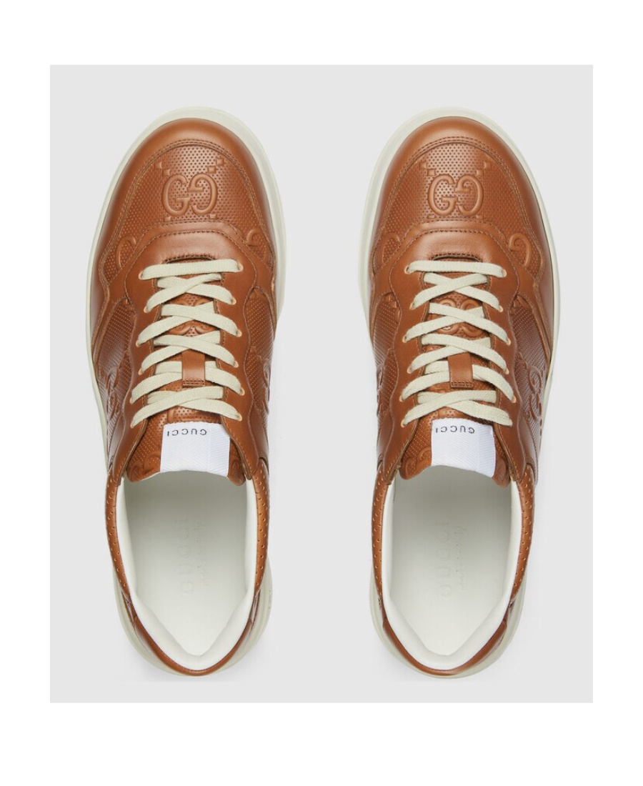 Gucci Gg Embossed-logo Sneakers In Brown
