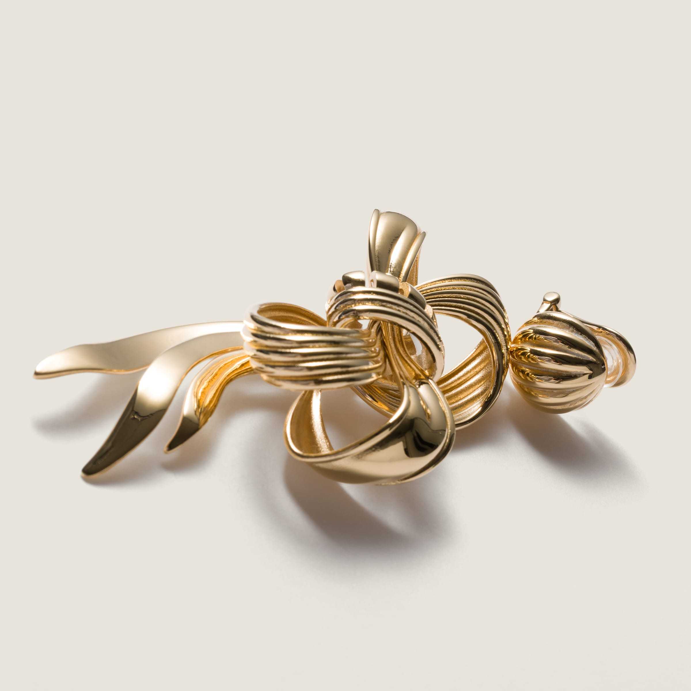 Miu Miu Metal Bow Earrings In Gold