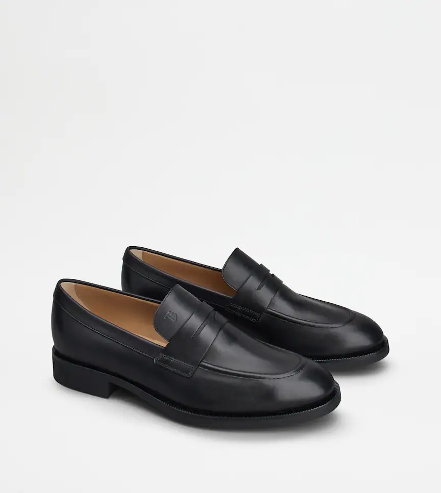 Tod's Round Toe Slip-on Loafers In Black