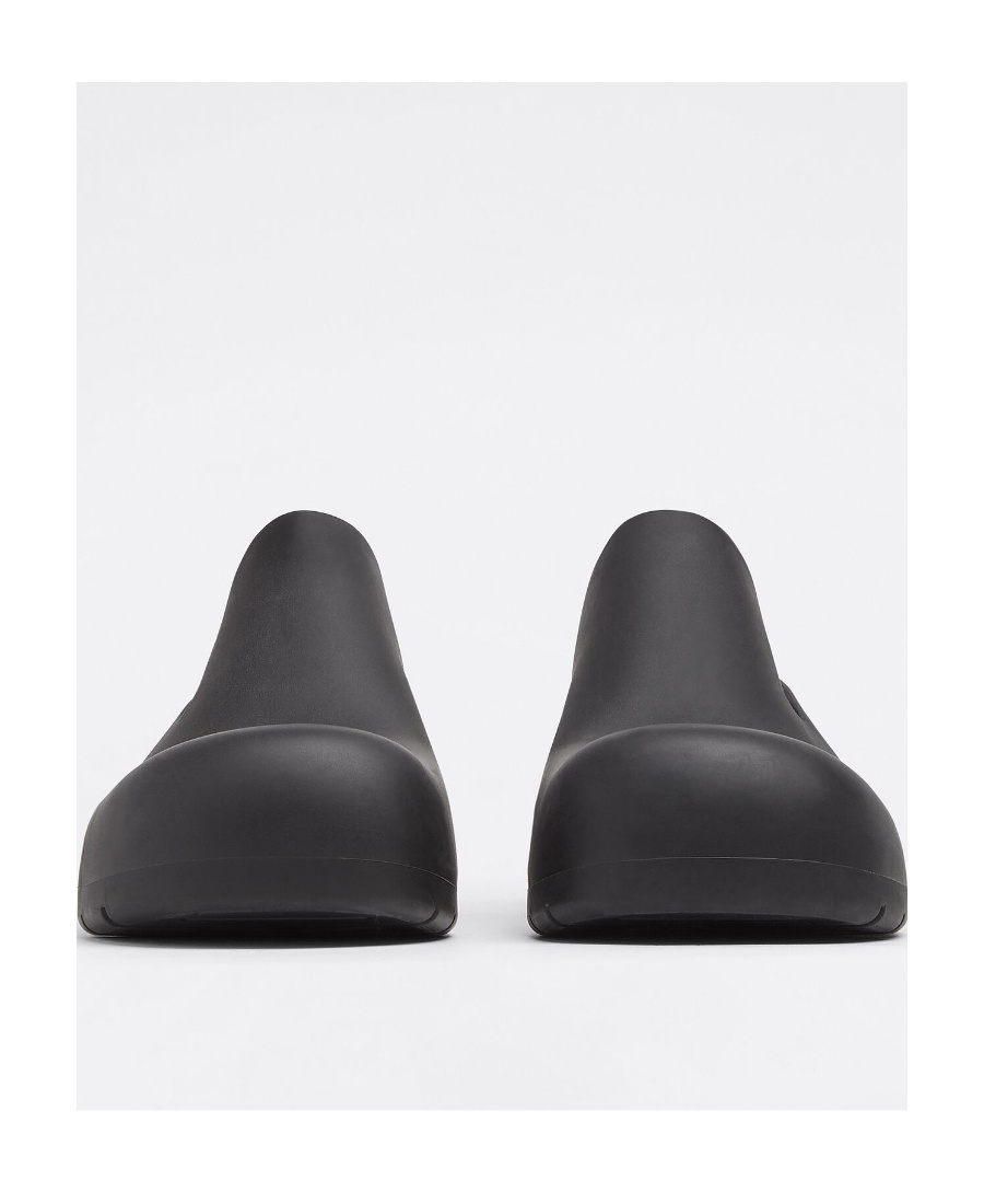 BOTTEGA VENETA PUDDLE SHEARLING-LINED SLINGBACK MULES