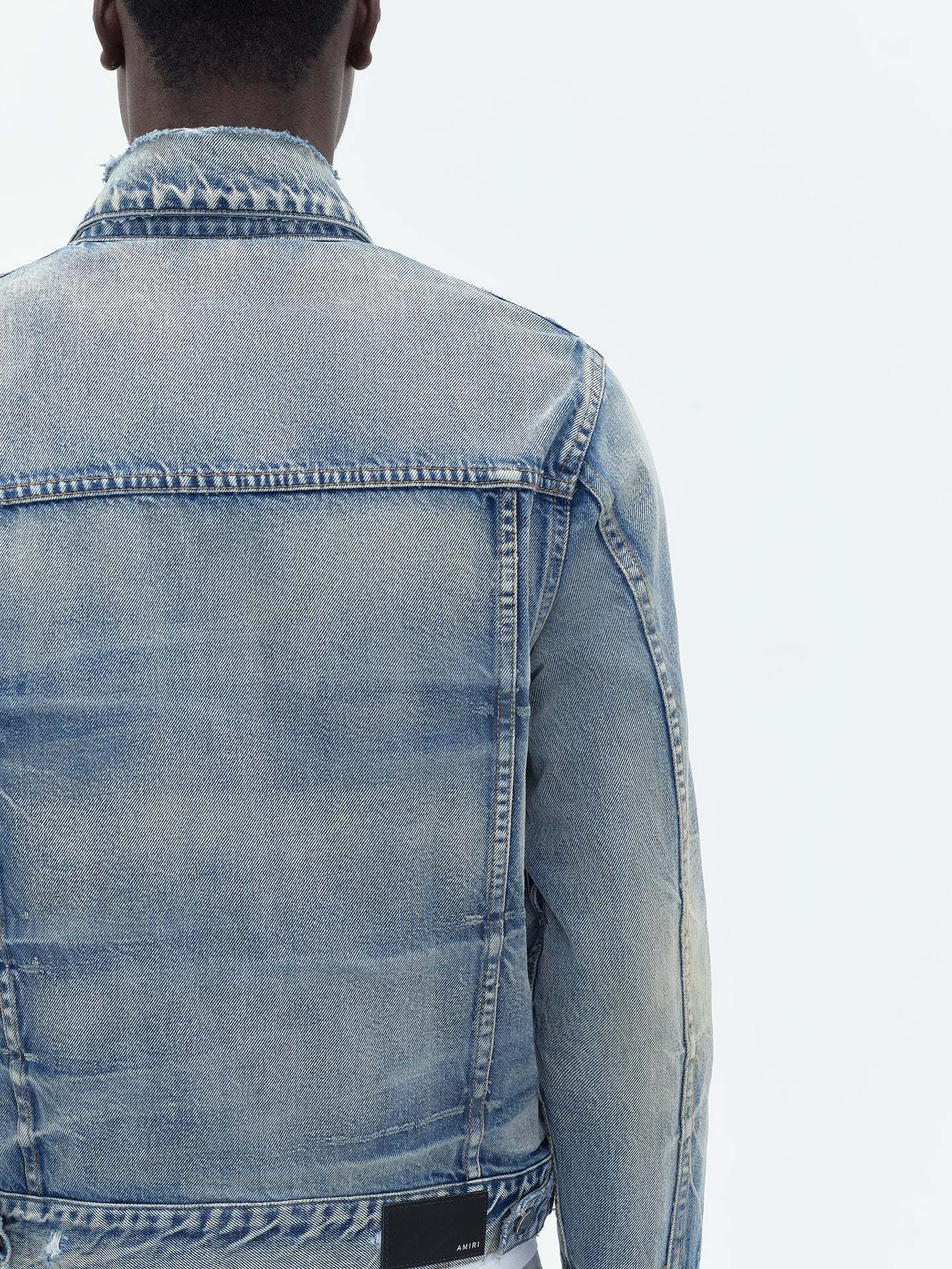 Amiri Ma Distressed Denim Trucker Jacket In Blue