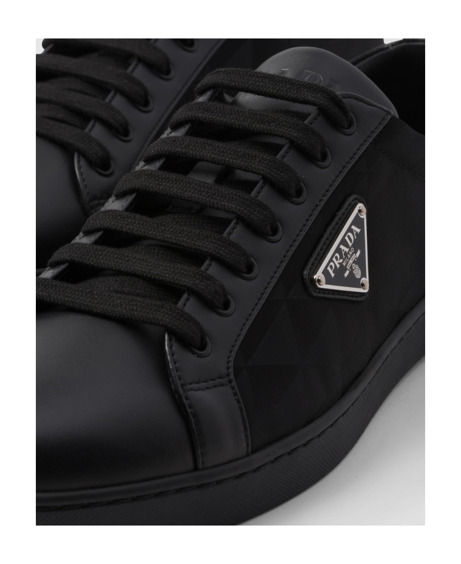 Shop Prada Leather And Nylon Sneakers In Black