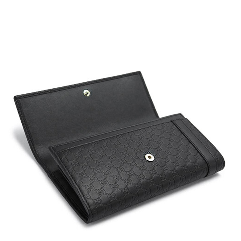 GUCCI EMBOSSED PURSE