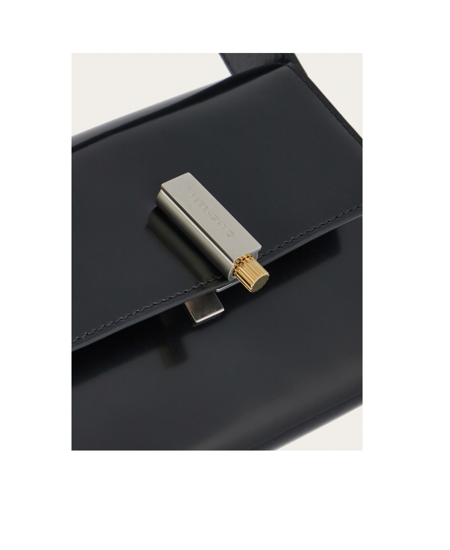 Shop Ferragamo Flip Shoulder Bag In Black