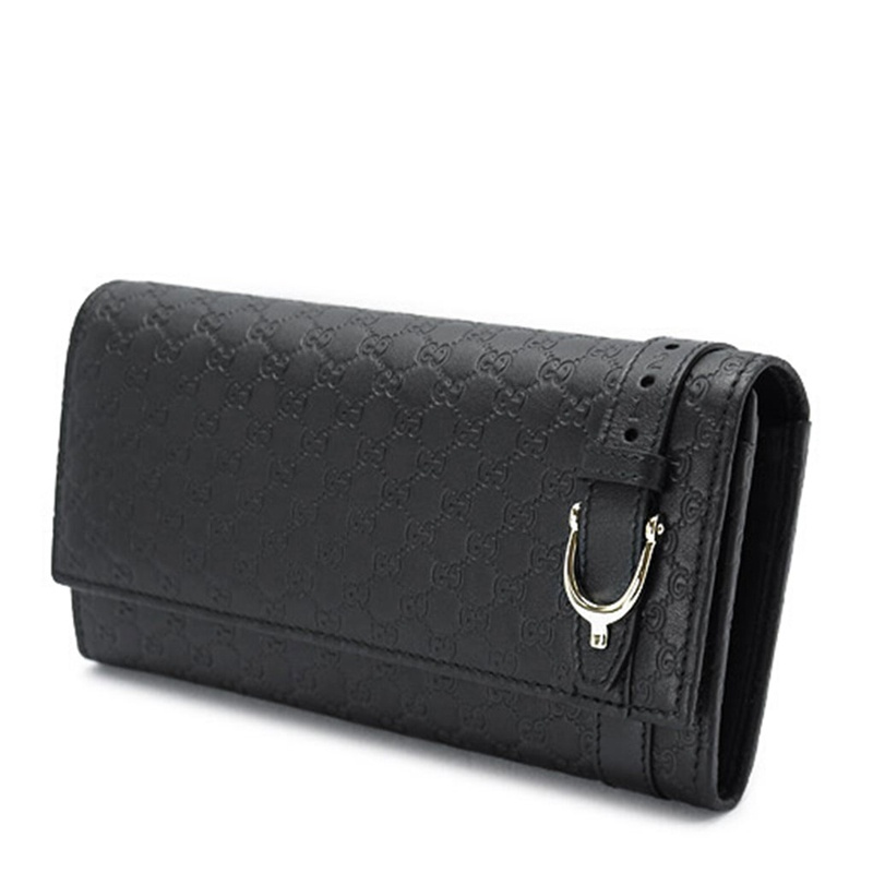 GUCCI EMBOSSED PURSE