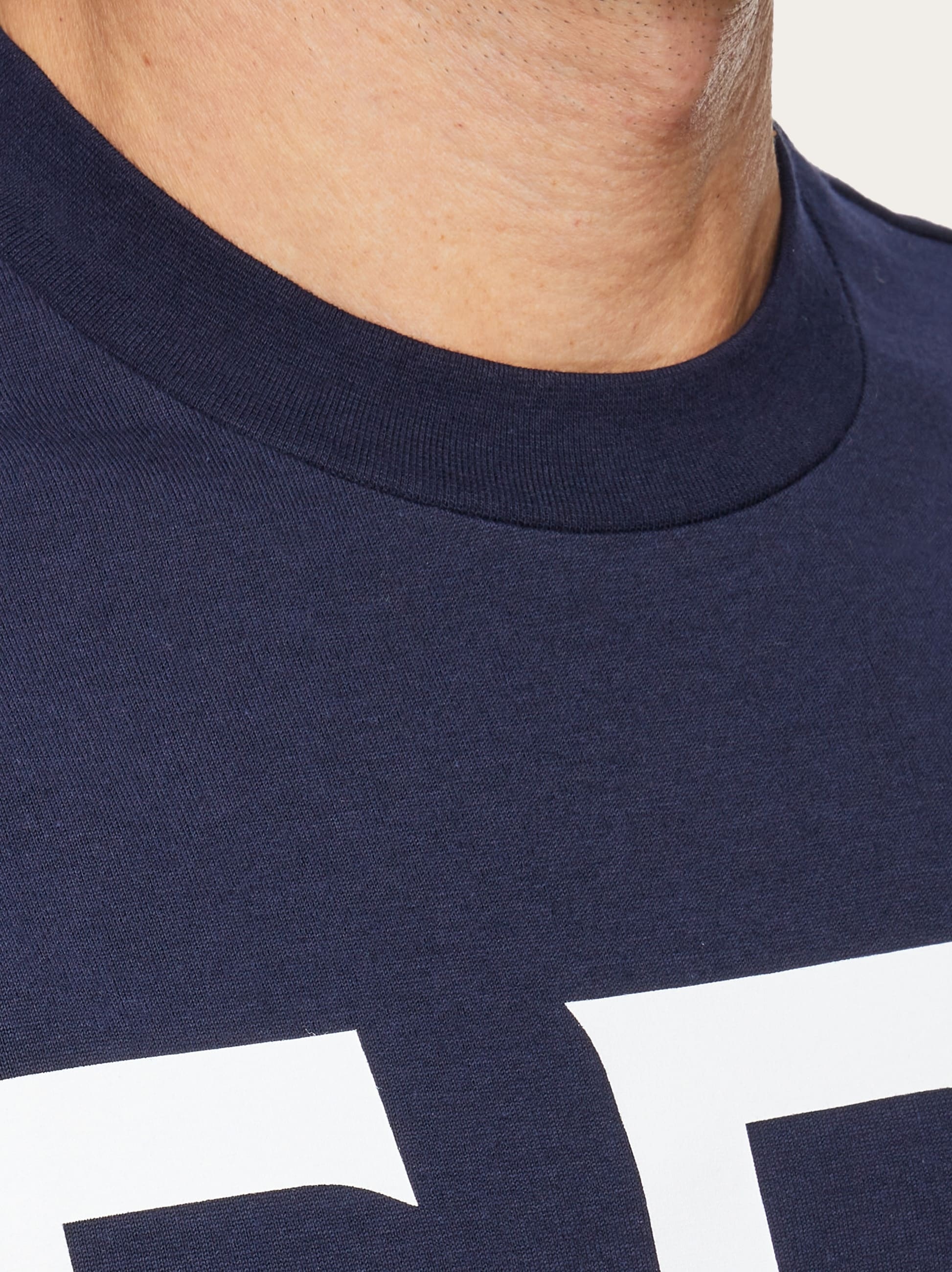 Ferragamo Patterned Logo Short-sleeved T-shirt In Black