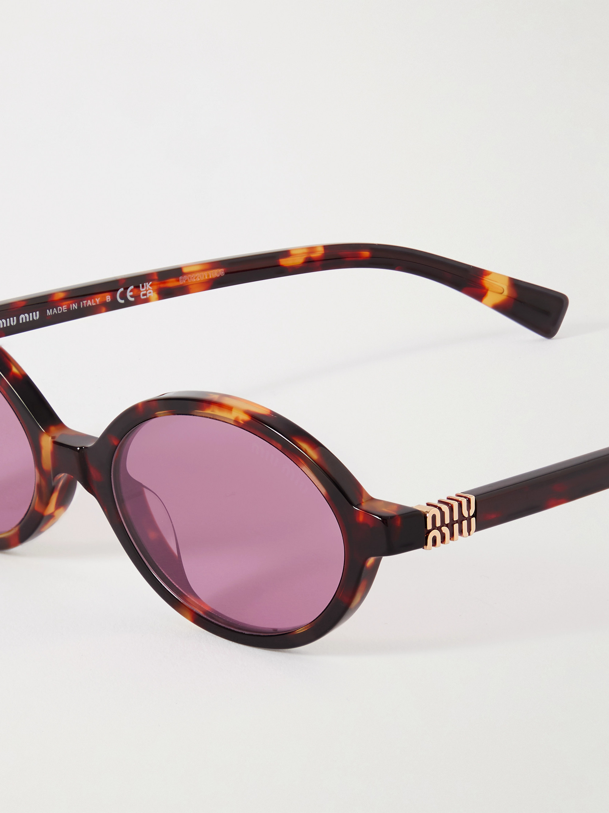 Miu Miu Oval Frame Sunglasses In Pink