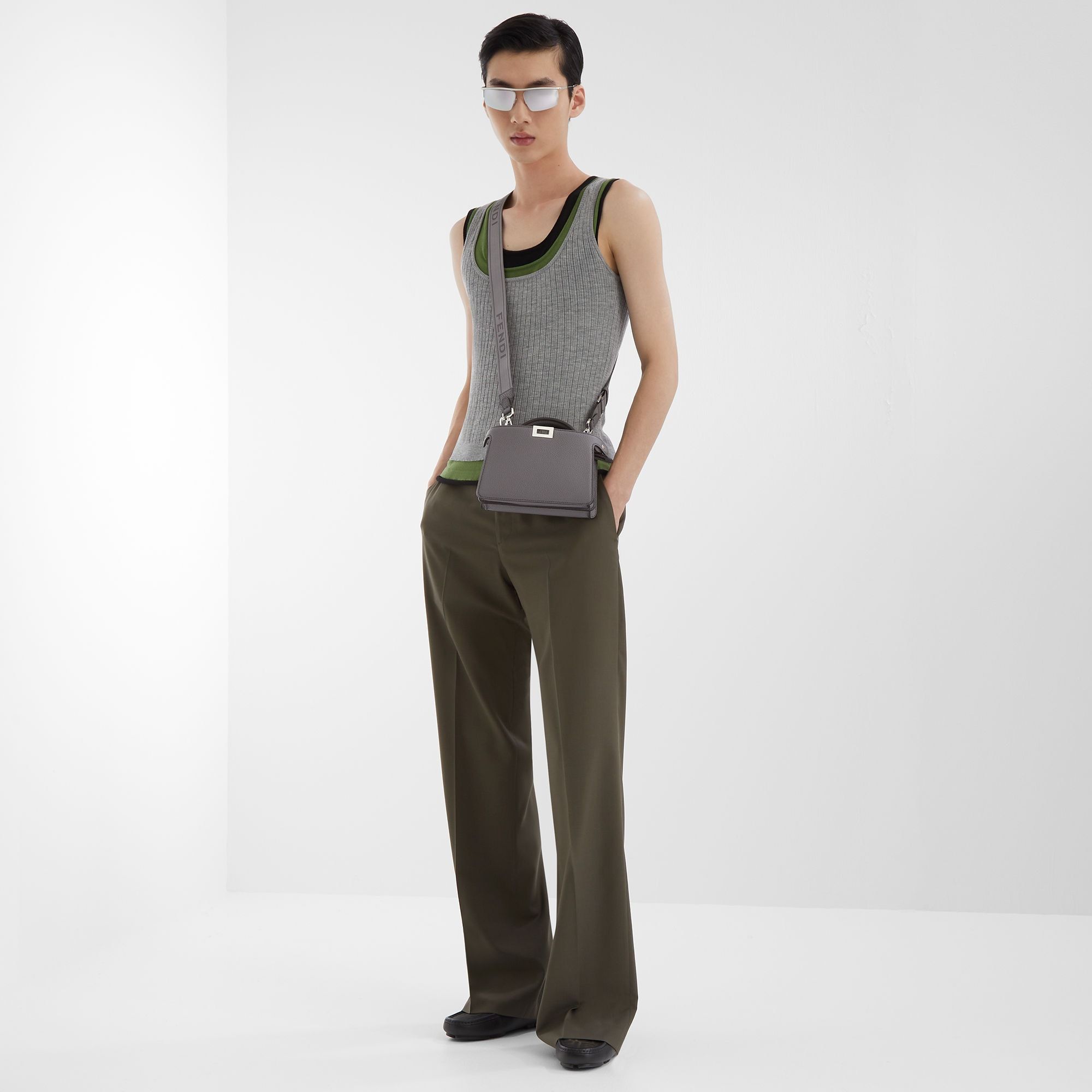 Fendi Round Toe Textured Leather Loafers In Black