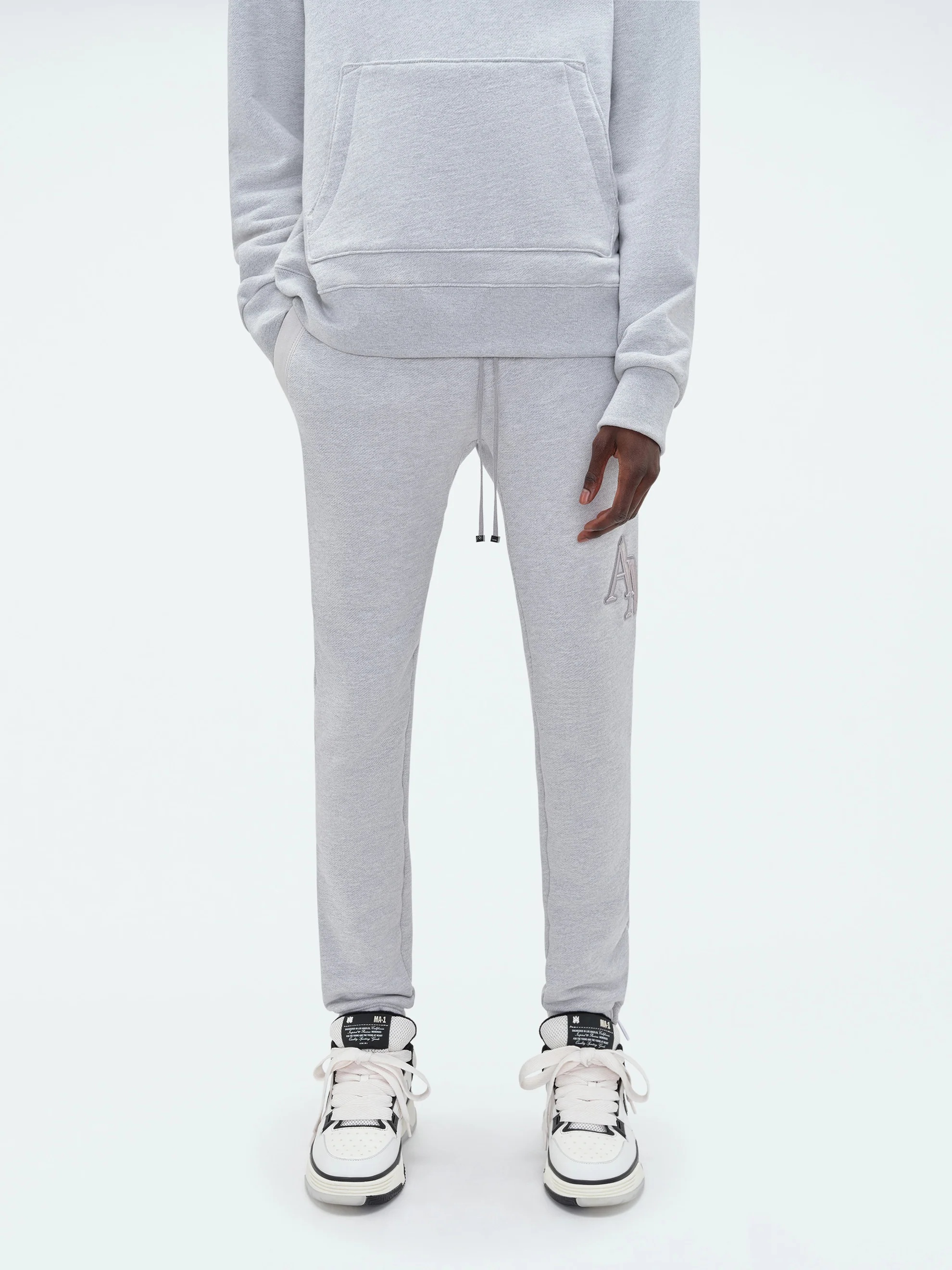 Amiri Logo Embroidered Sweatpants In Gray