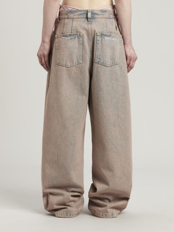 Shop Palm Angels Logo-embroidered Overdye-wash Jeans In Nude