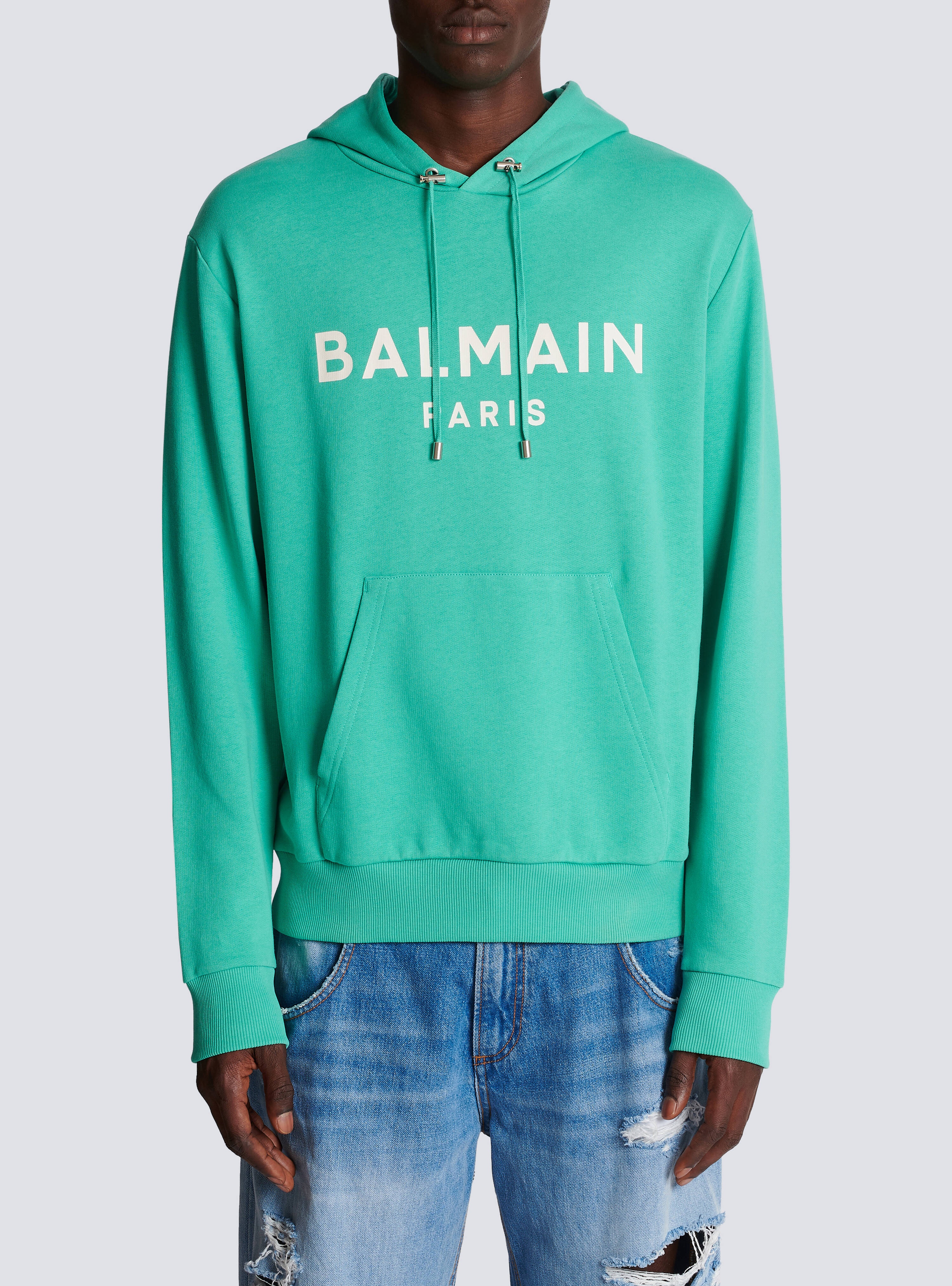 BALMAIN COTTON PRINTED BALMAIN LOGO HOODIE 