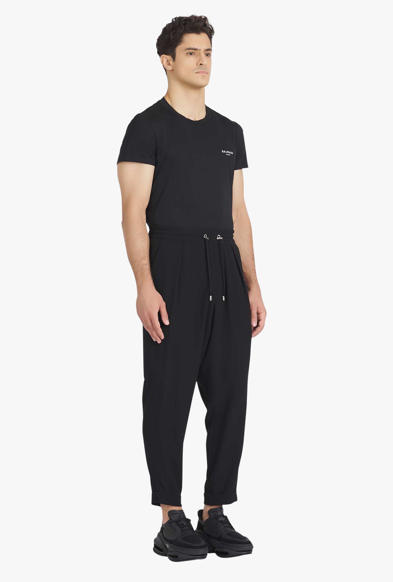Balmain Timeless Embossed-button Drawstring-waist Trousers. In Black