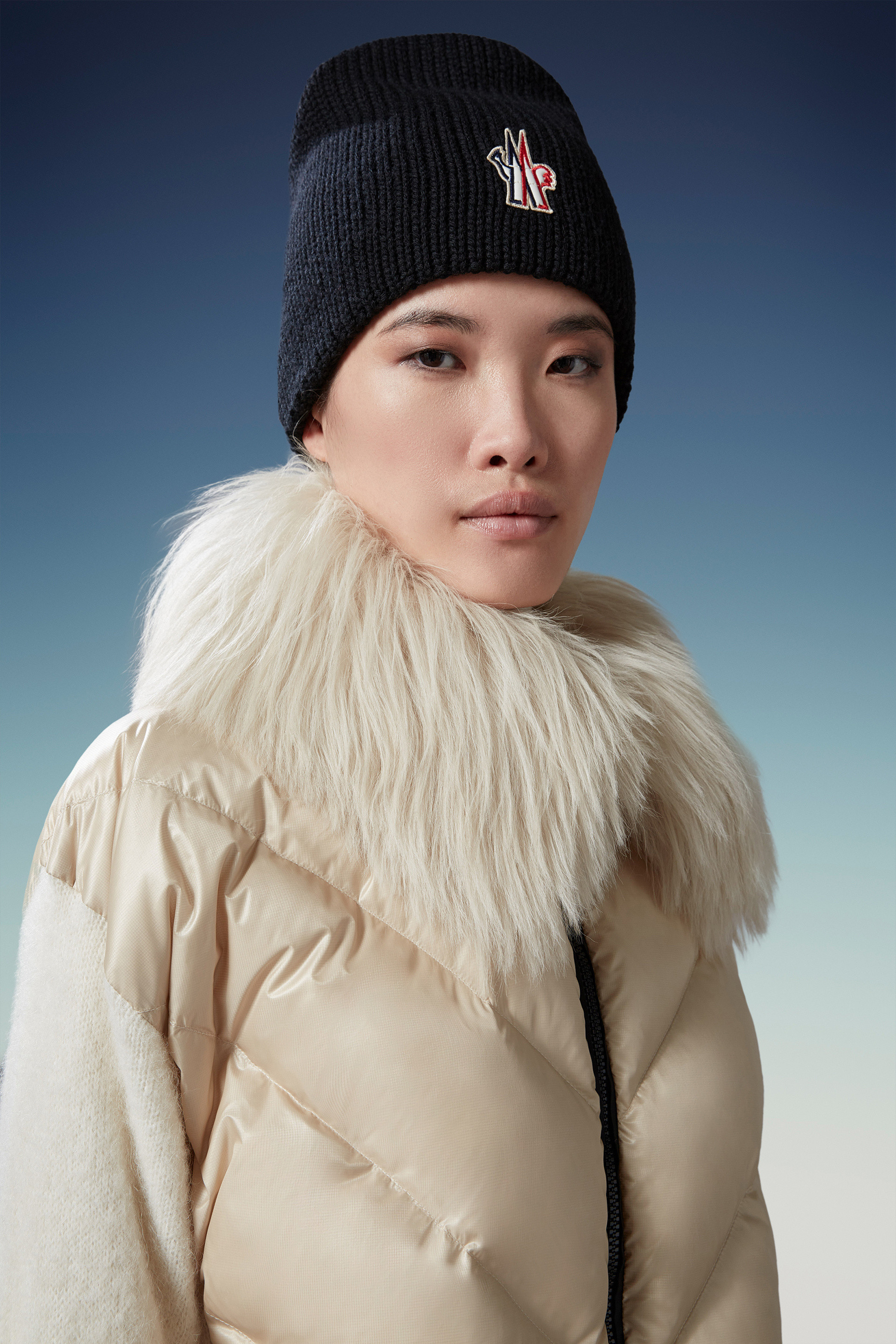 Moncler Logo-embroidered Virgin Wool Beanie In Black