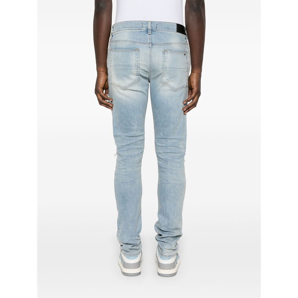 AMIRI AMIRI MX1 DISTRESSED JEANS