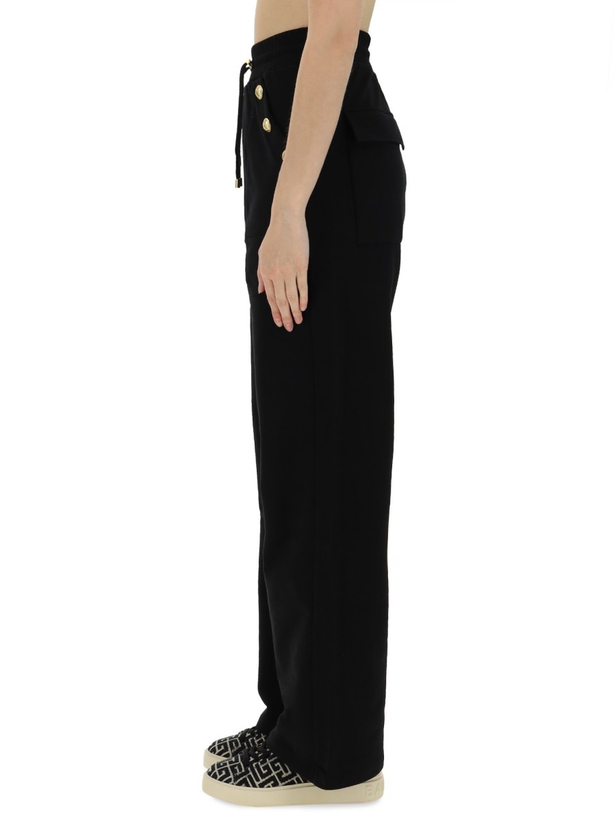Shop Balmain Loose-fitting Buttoned Joggers In Black