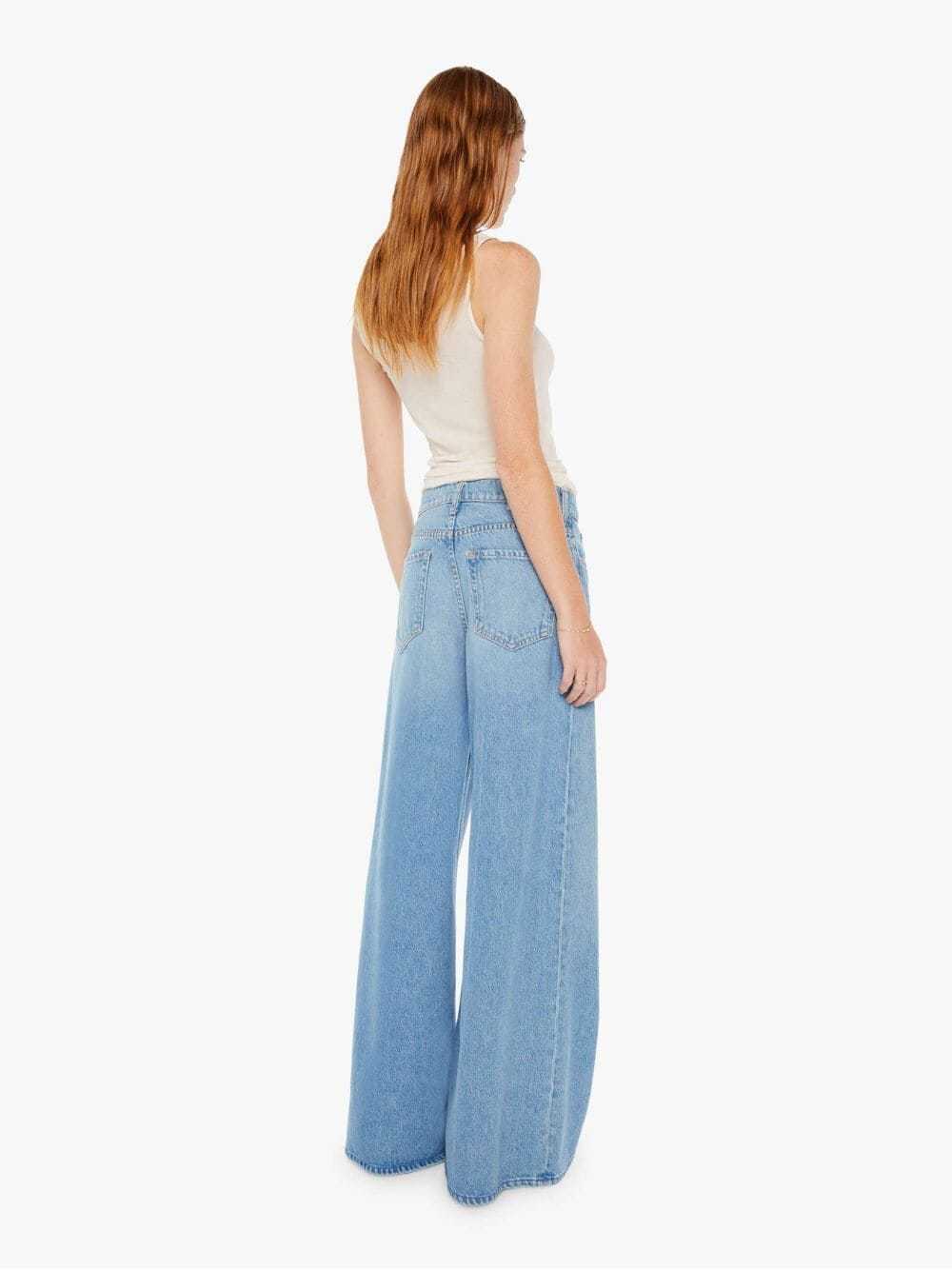 Mother Slung Sugar Cone Sneak Low-rise Flared Jeans In Blue