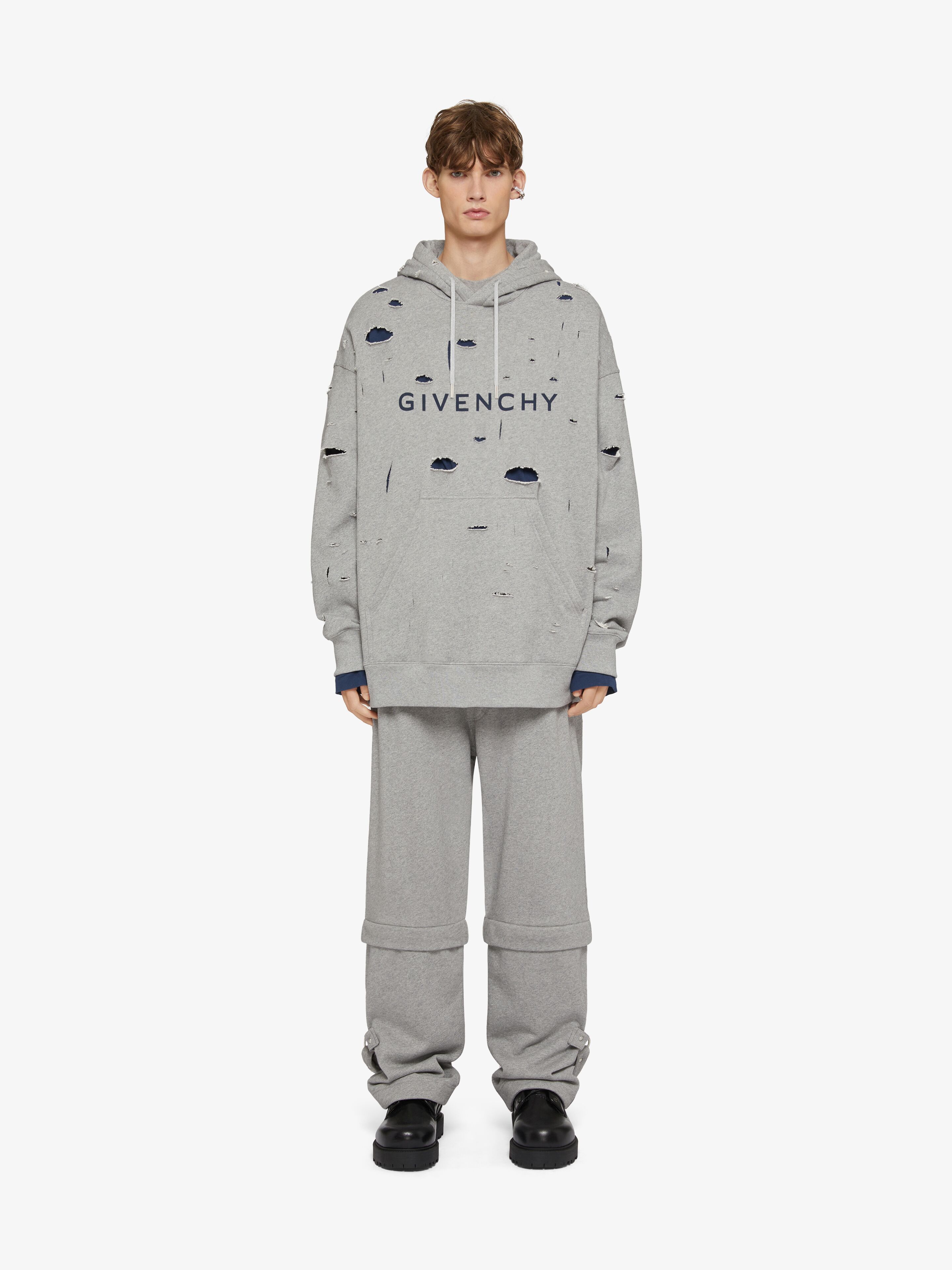 Givenchy A Hooded Sweater With A Broken Hole In Gray
