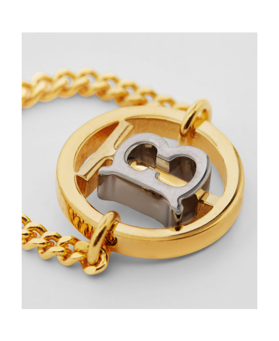 Shop Burberry Gold And Palladium-plated Monogram Motif Ring In Yellow