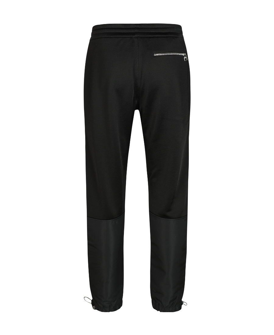Alexander Mcqueen Panelled Tapered Track Pants In Black