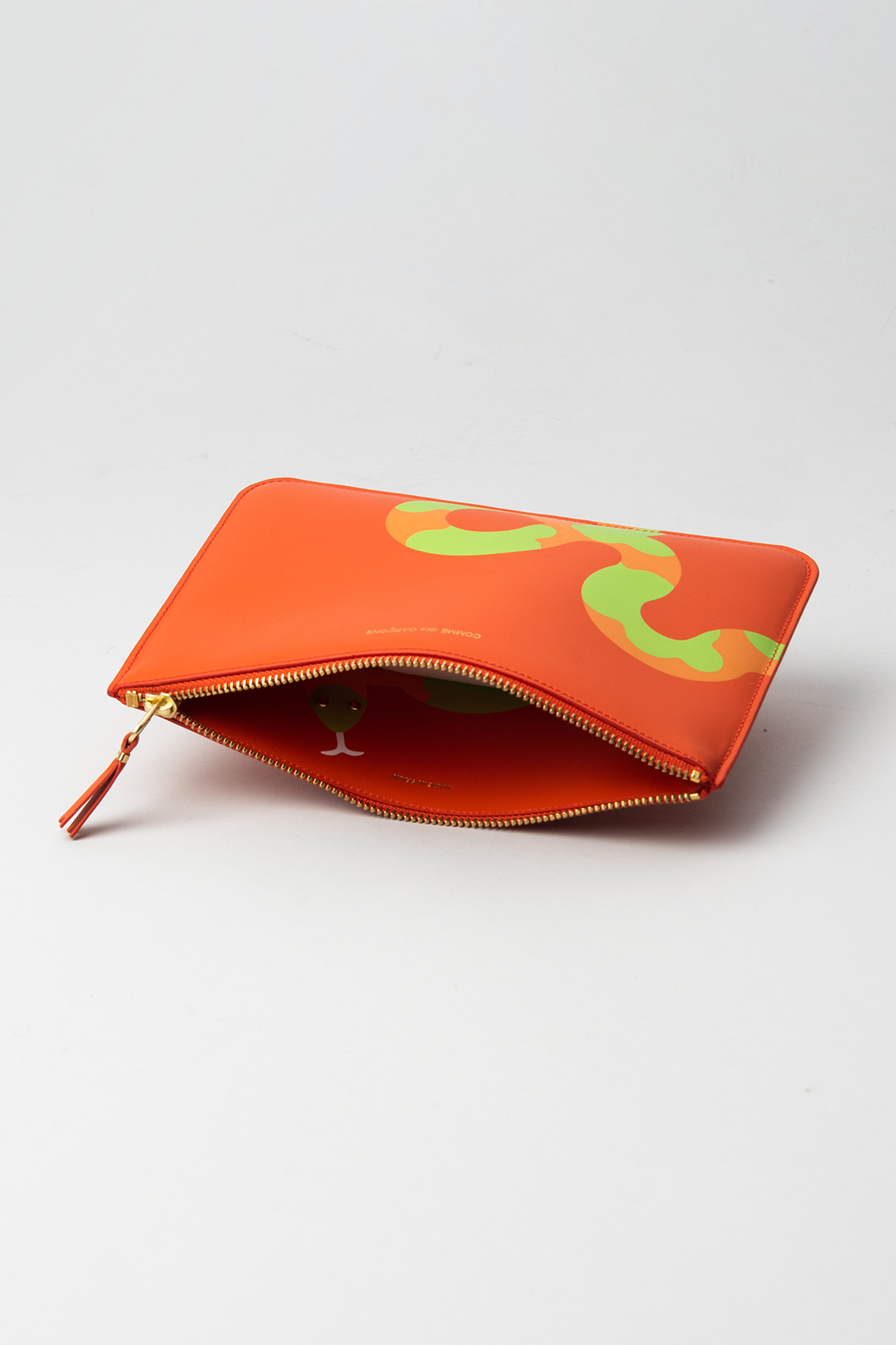 Comme Des Garçons Graphic-print Leather Clutch Bag In Red
