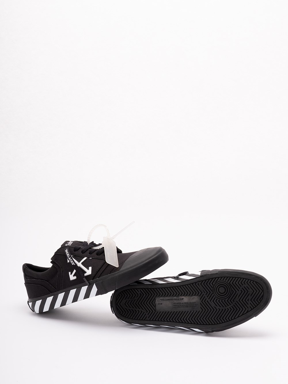 Off-white Low-top Canvas Sneakers Featuring Contrast Stripe In Black