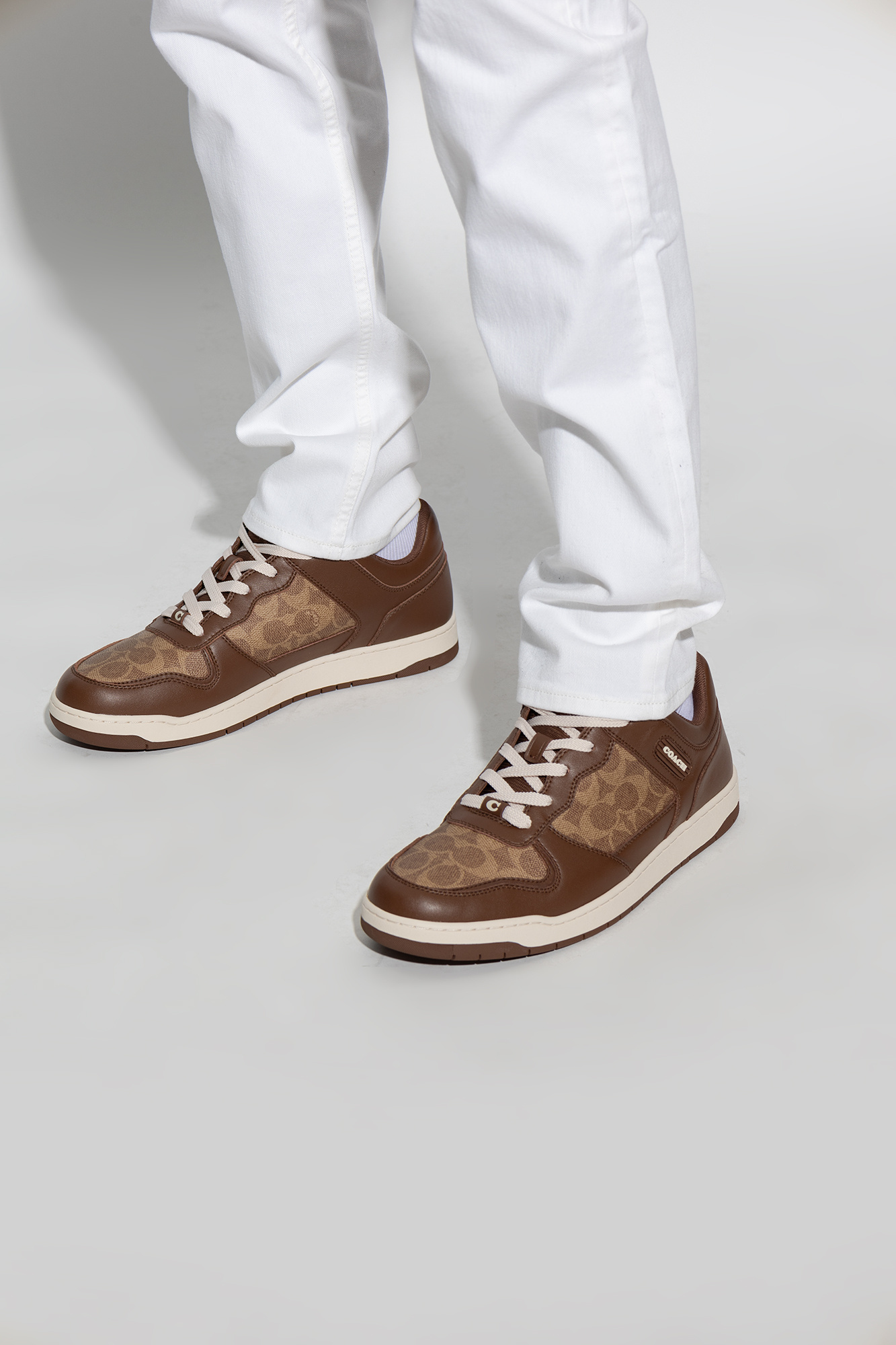 COACH LOGO-DEBOSSED PANELLED LEATHER SNEAKERS