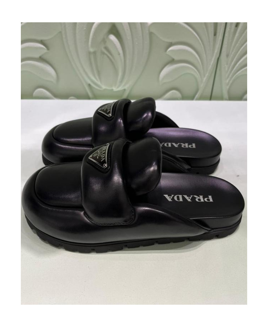 Prada Padded Leather Sabots In Black