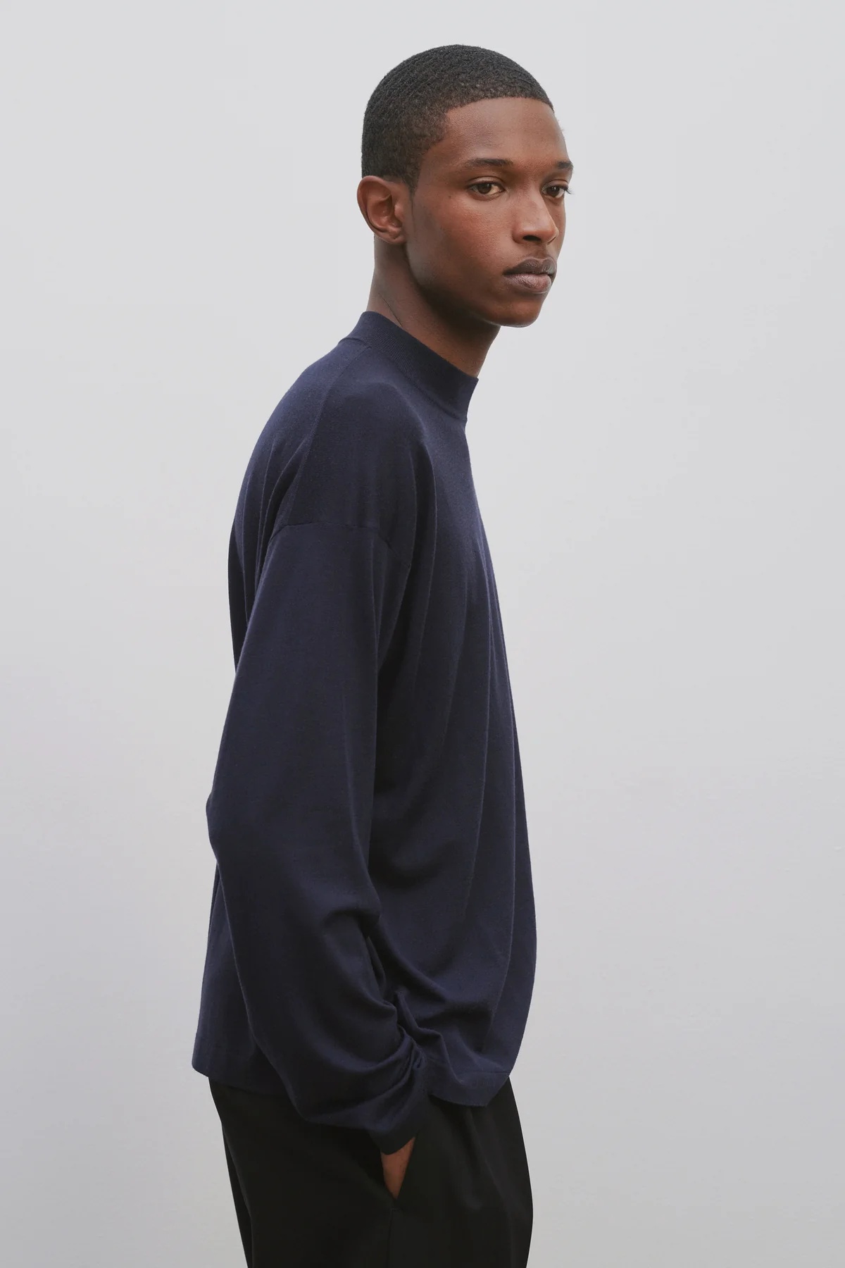 The Row Delsie Wool Small Turtleneck Sweater In Black