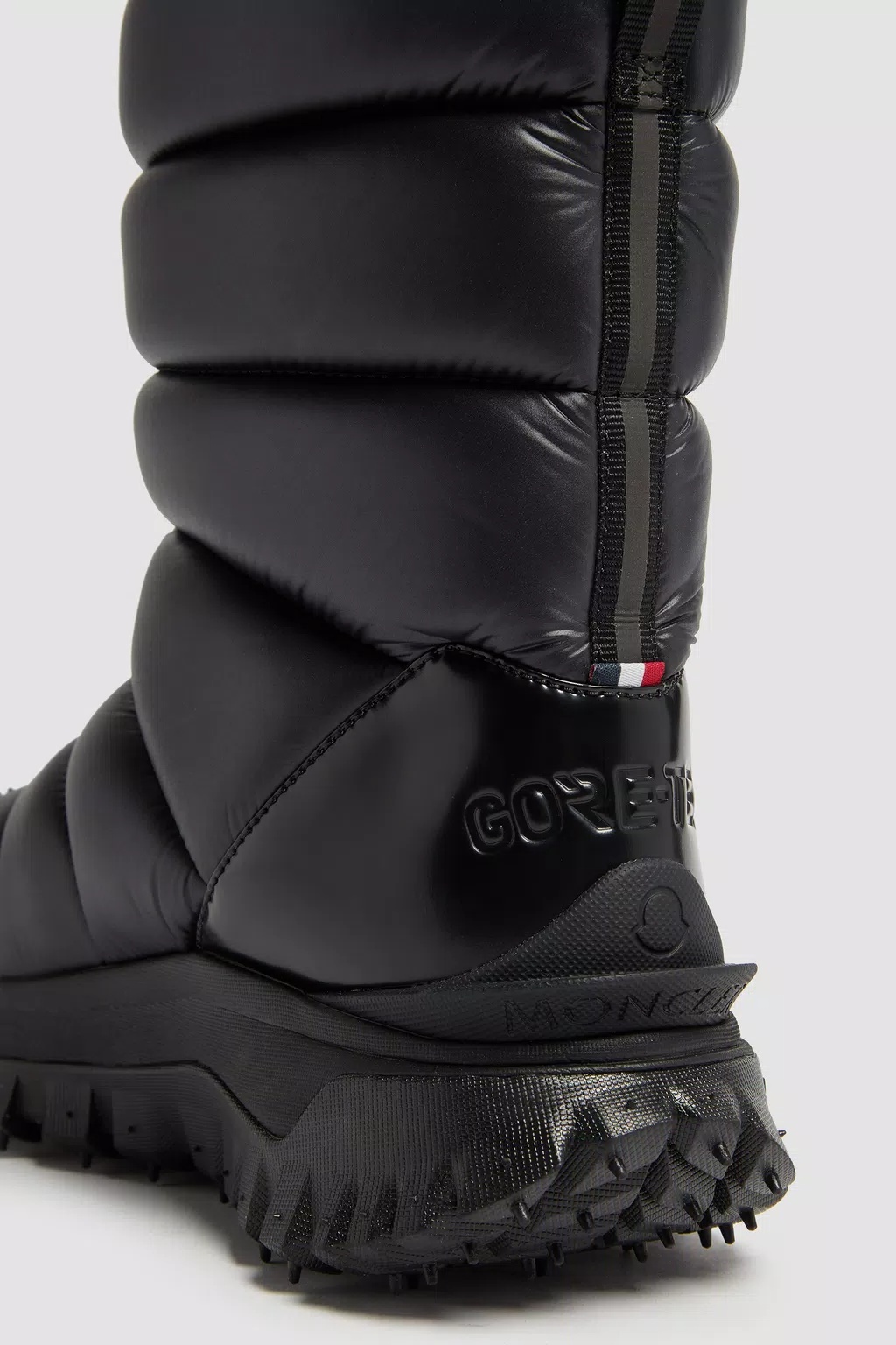 Moncler Trailgrip Appliquéd Quilted Padded Glossed Leather-trimmed Shell Snow Boots In Black